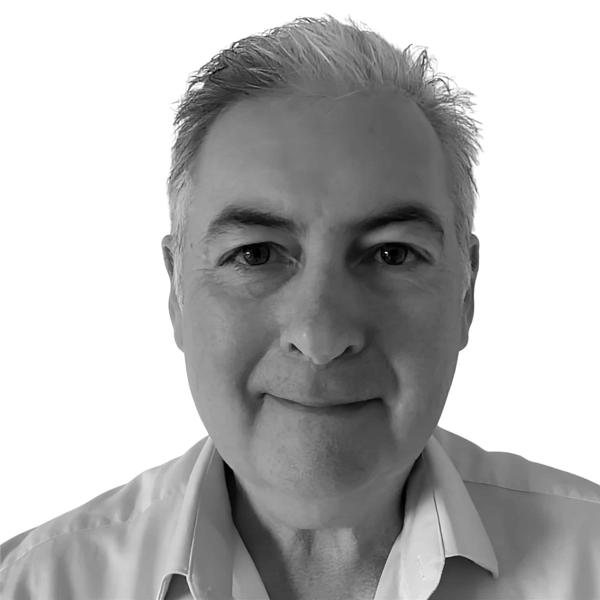 A black and white headshot photograph of Hugh Ivory