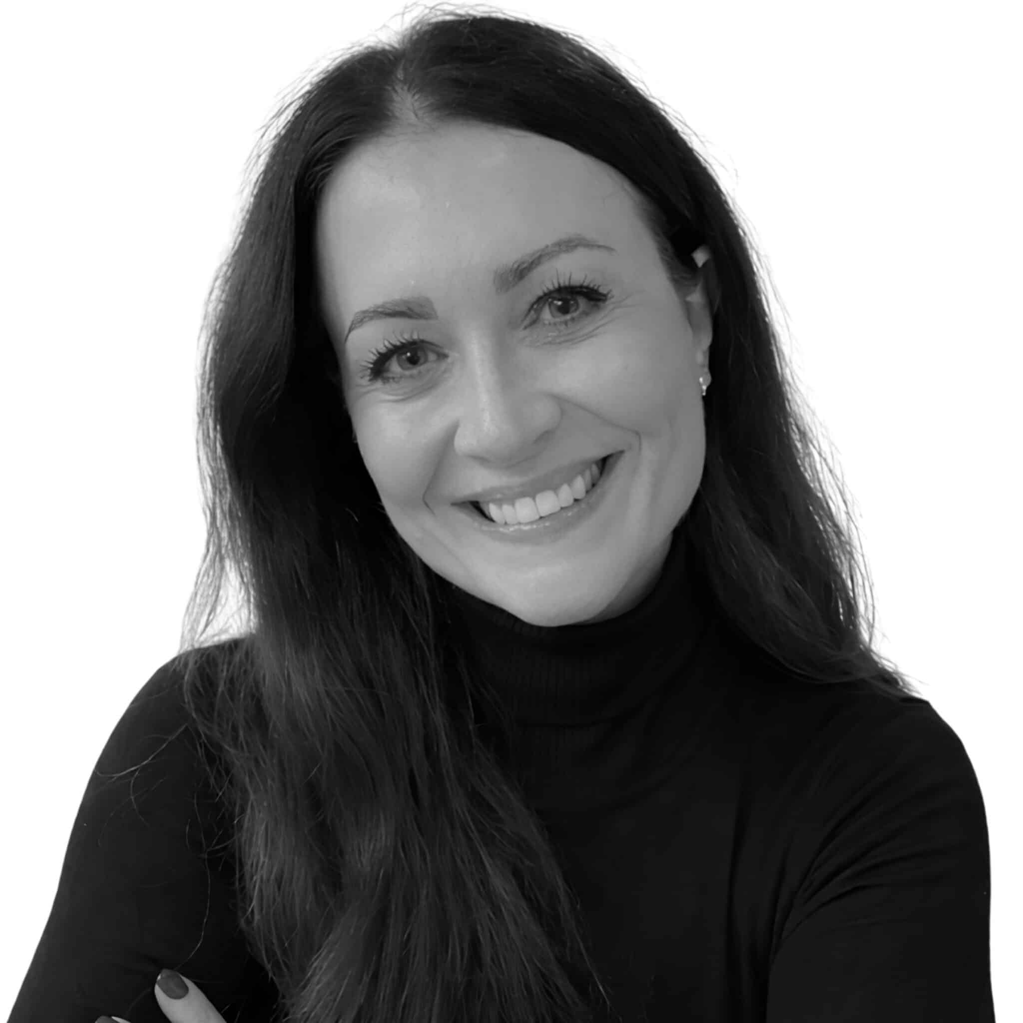 A black and white headshot photograph of Karen McAllen