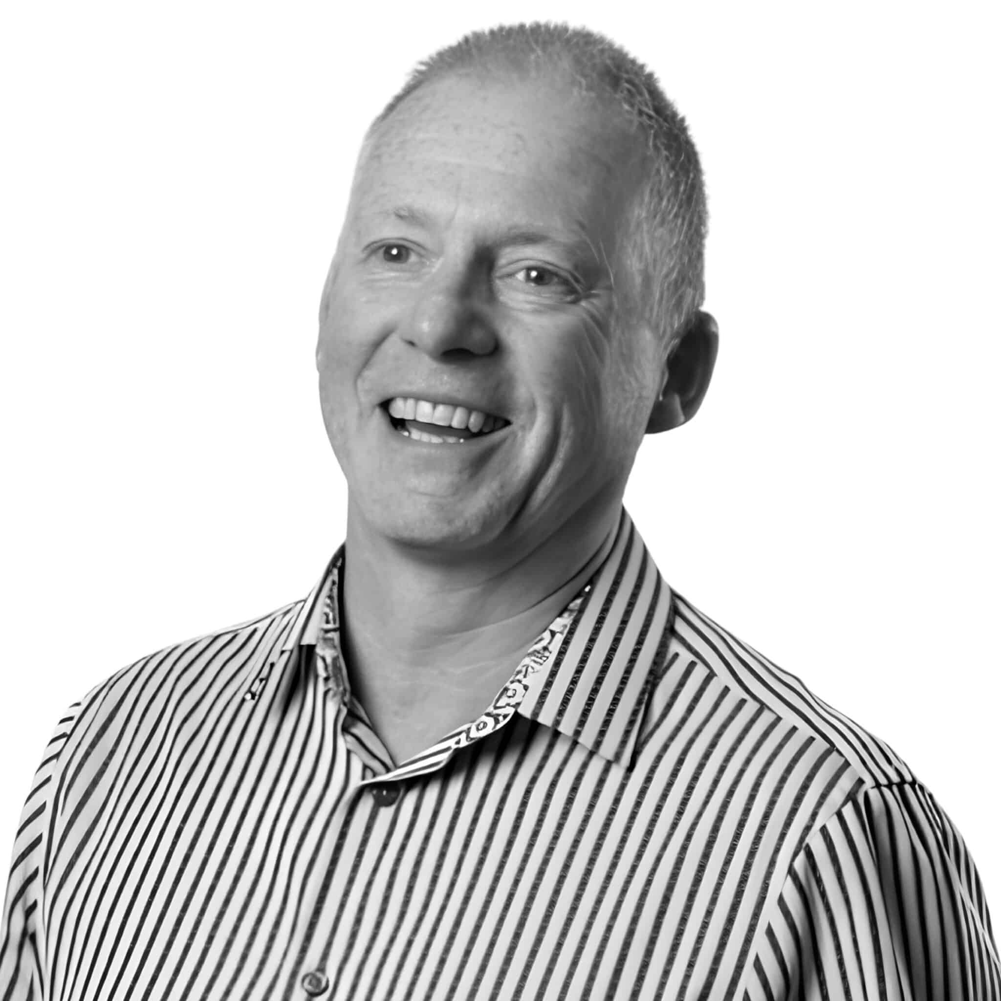 A black and white headshot photograph of Richard Campbell
