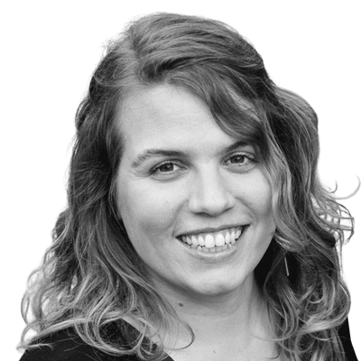 A black and white headshot image of Katie Langdon
