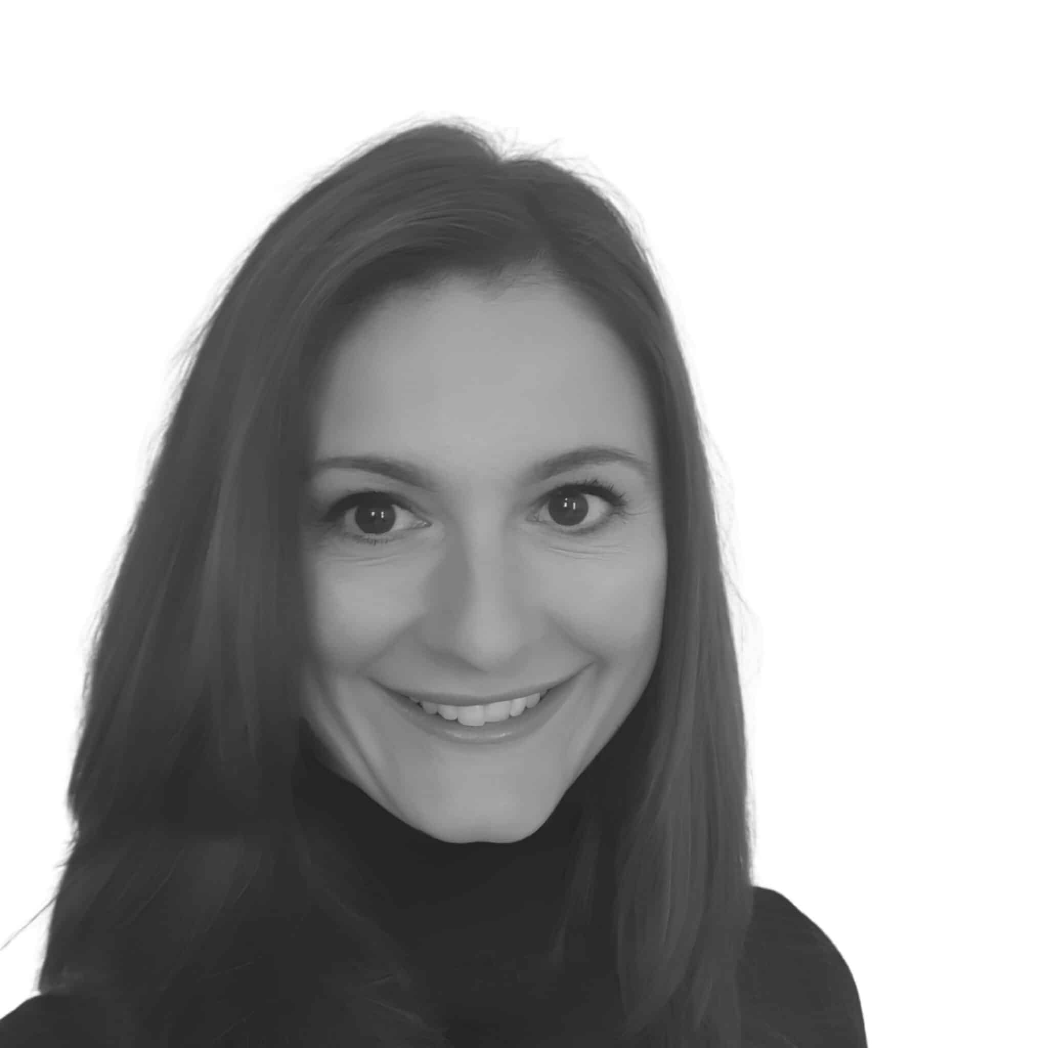 A headshot image of Katy Stanley in black and white
