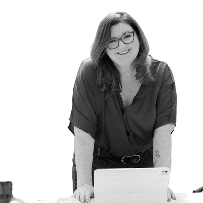 A black and white headshot image of Kirsten Dixon
