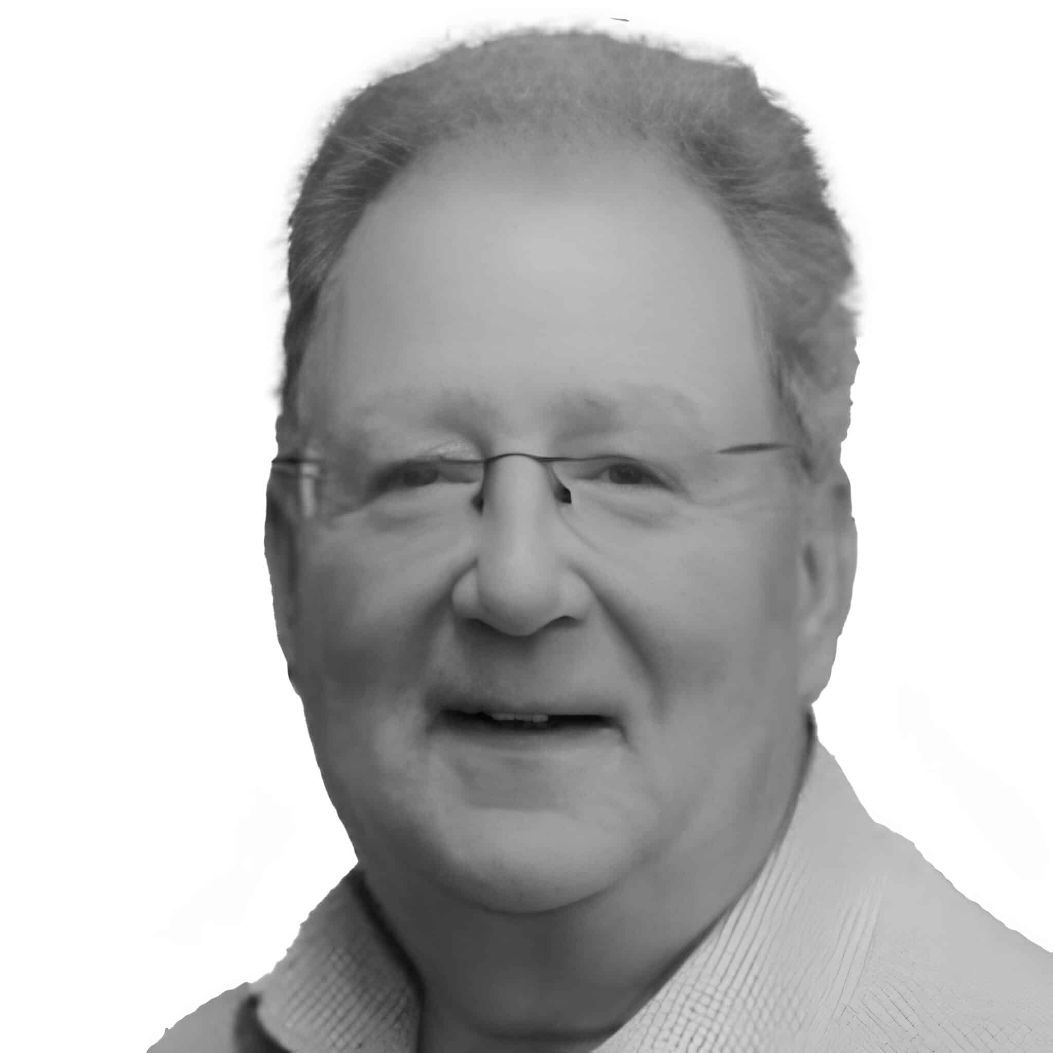 A headshot photograph of Vince Grant