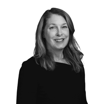 A black and white headshot image of Zoe Merchant