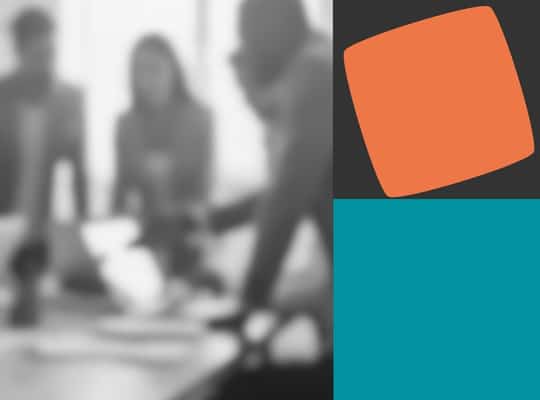 A blurred image of a team meeting around a laptop on a table with coloured shapes to the side of the image to represent the Agile Business Consortium branding