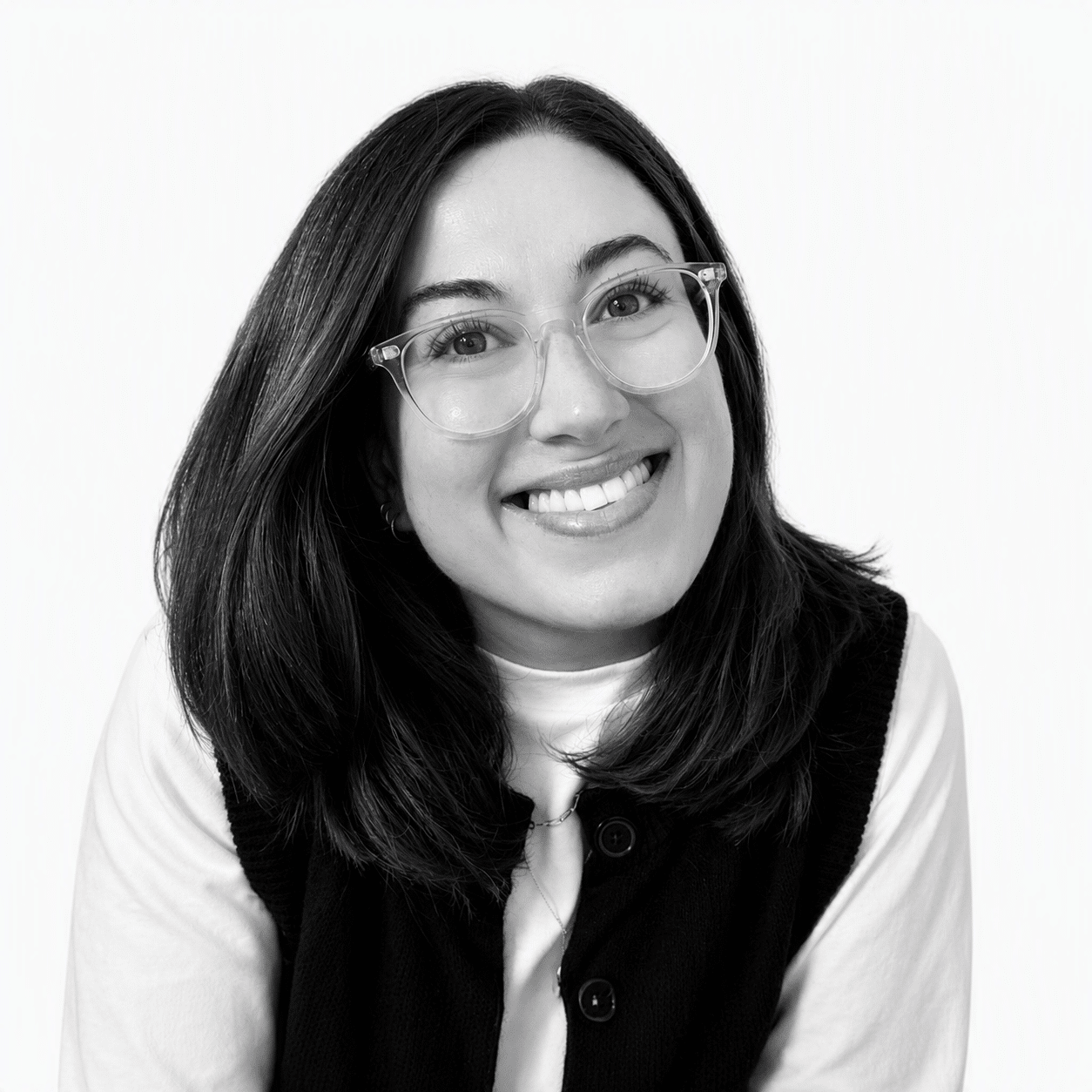 A black and white headshot photograph of Charlotte McAndrew