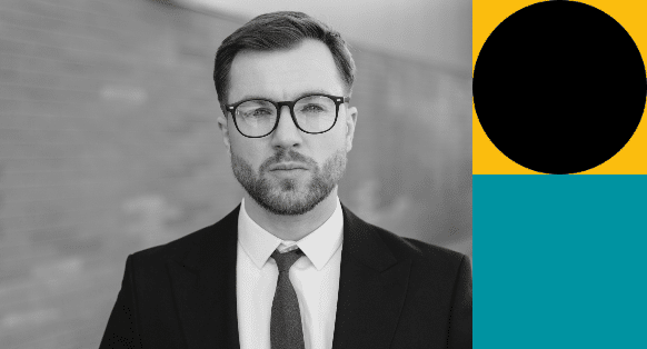 A black and white headshot image of a man with glasses. Accompanied by teal and yellow brand shapes.